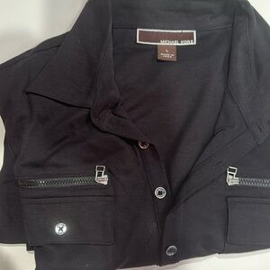 Michael Kors black polo with zipper pockets in large